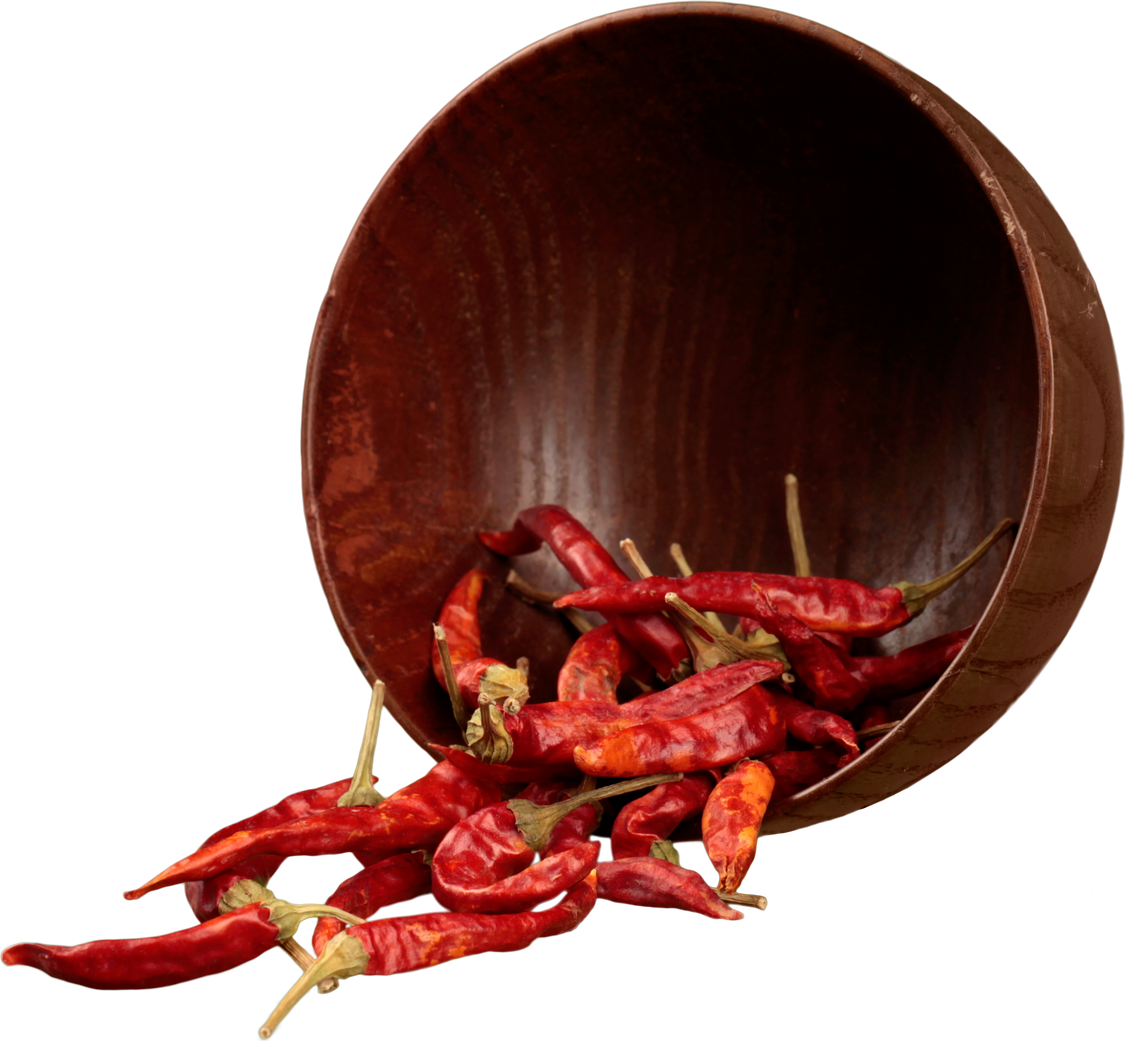 Dried Chili Peppers Falling Out of a Bowl